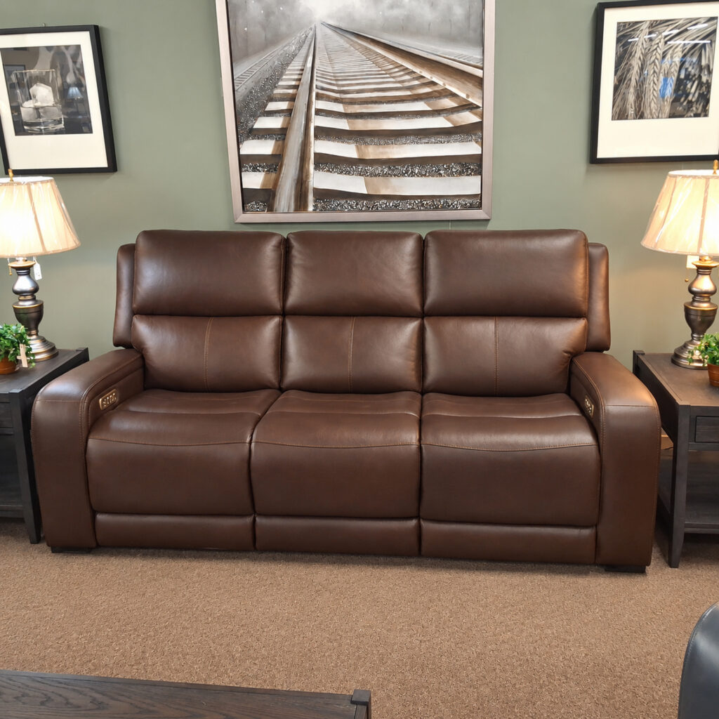 Brown leather Flexsteel power reclining sofa.