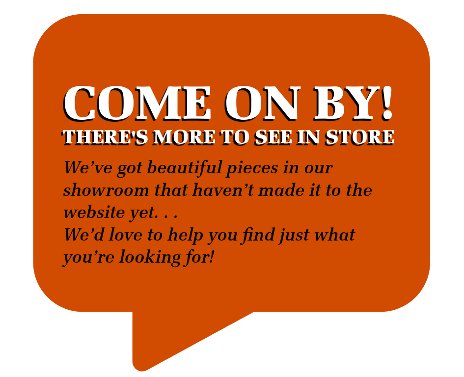 Sign encouraging customers to visit the showroom for in-store inventory not listed online.