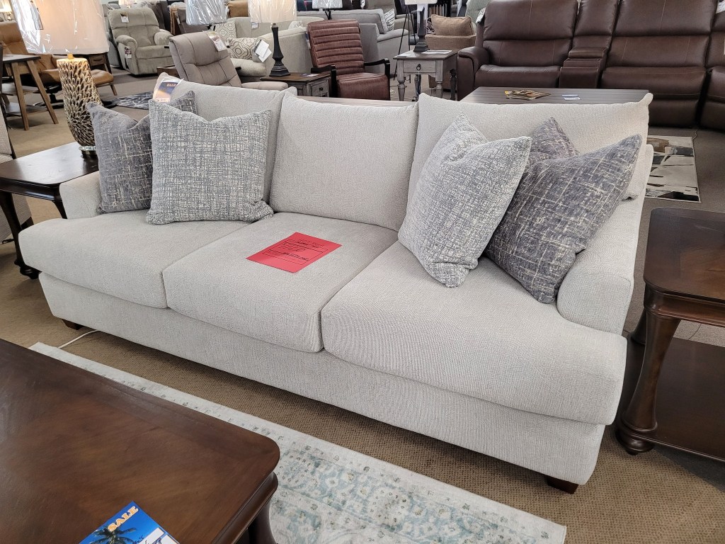 Decor-Rest sofa with modern lines and soft upholstery, ideal for a cozy yet stylish living room.