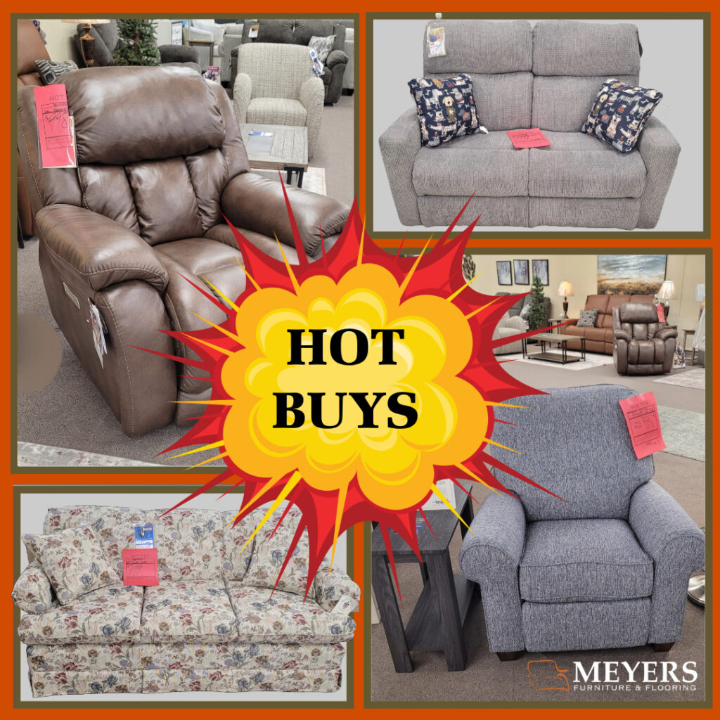 Hot Buys floor model clearance at Meyers Furniture featuring recliners, loveseats, and sofas with sale tags.