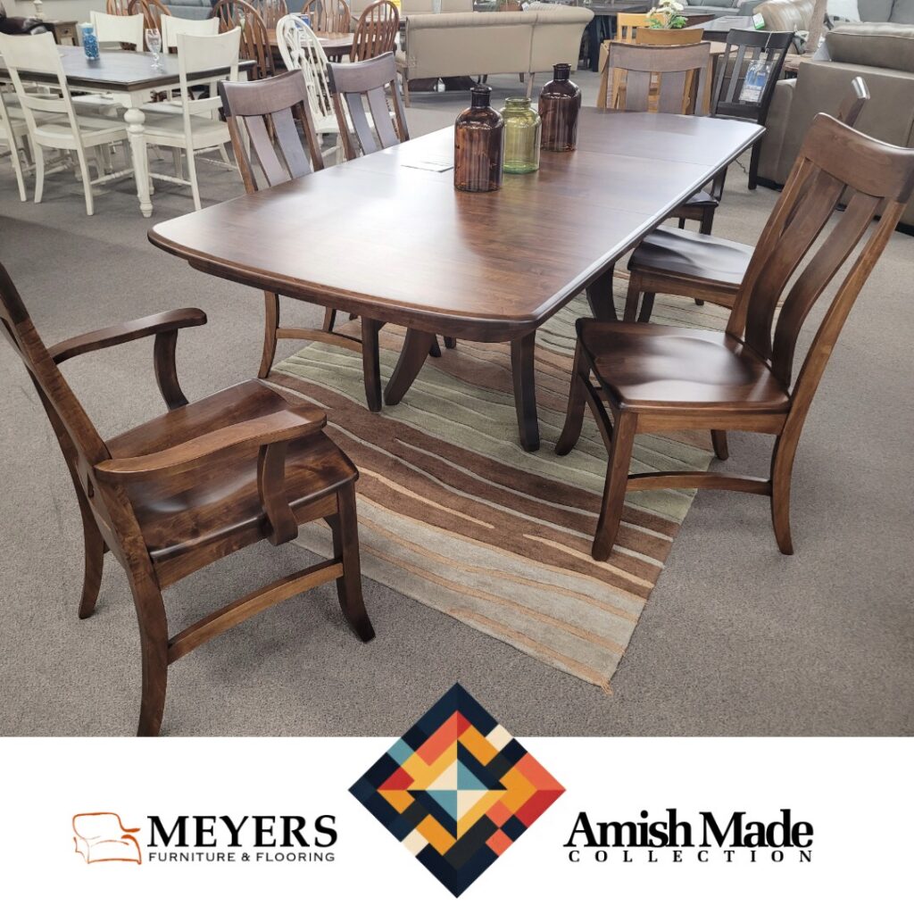 Amish Made dining set with rich dark finish and curved-back chairs at Meyers Furniture.