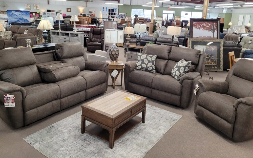 HomeStretch fabric sofa and loveseat set displayed on the showroom floor at Meyers Furniture & Flooring in Mendota, Illinois