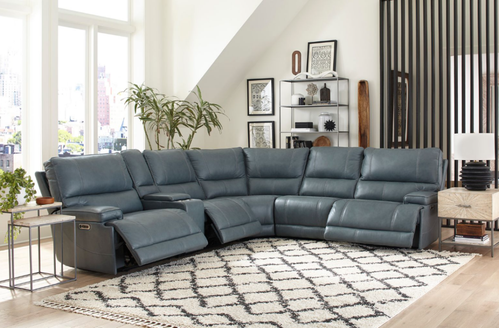 Blue gray Parker House reclining sectional shown in a bright living room with recliners extended.