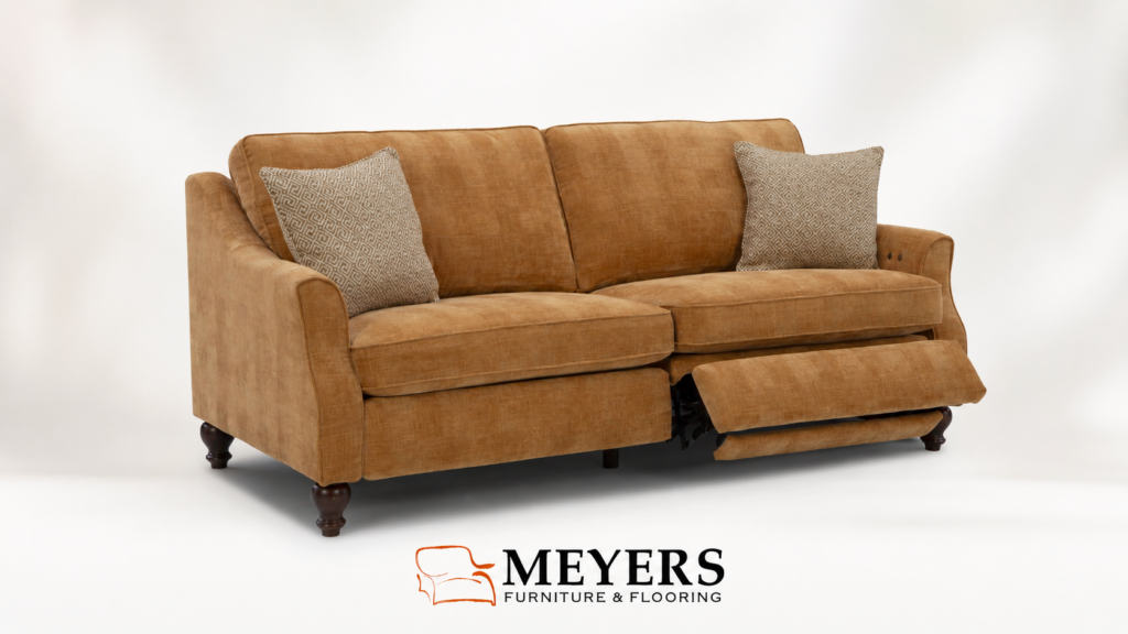 Best Home Furnishings reclining sofa in warm caramel fabric with Meyers Furniture and Flooring logo