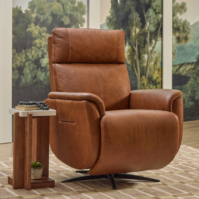 Flexsteel Cove leather power swivel recliner in warm brown leather with Meyers Furniture and Flooring logo