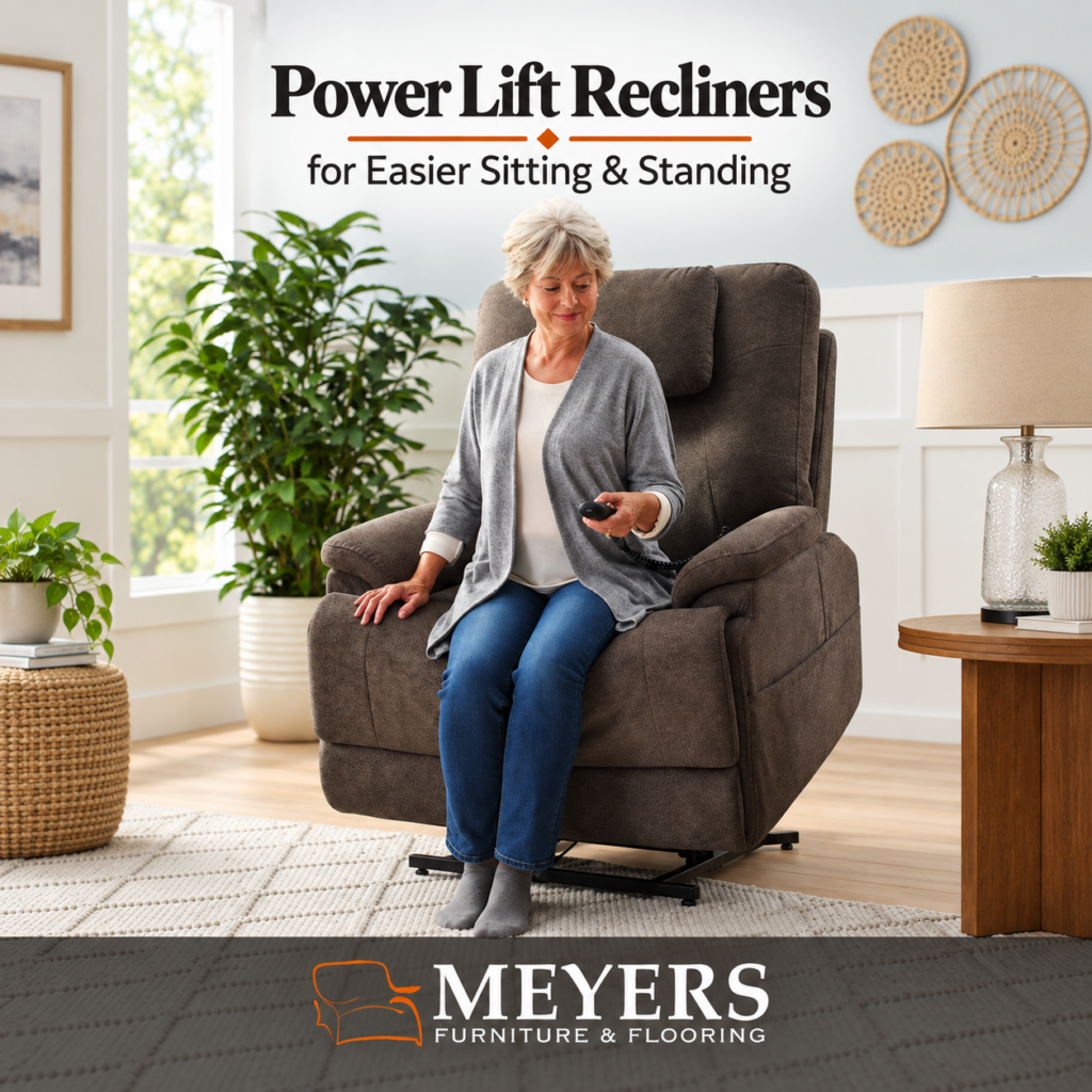 Woman using remote control while seated in gray power lift recliner