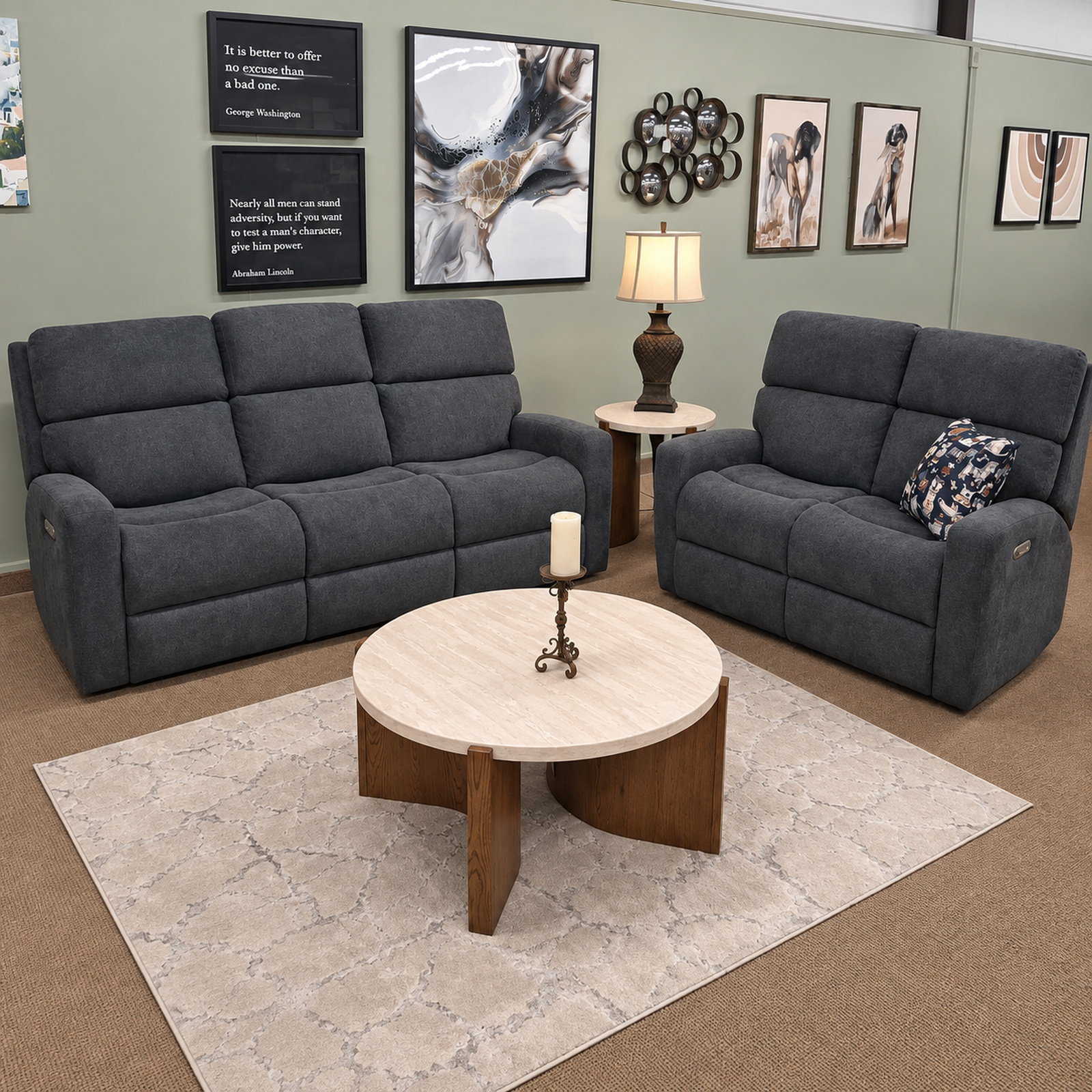 Dark gray Flexsteel reclining sofa and loveseat with divided padded backs.